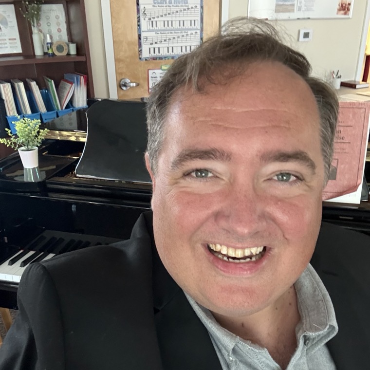 At the piano